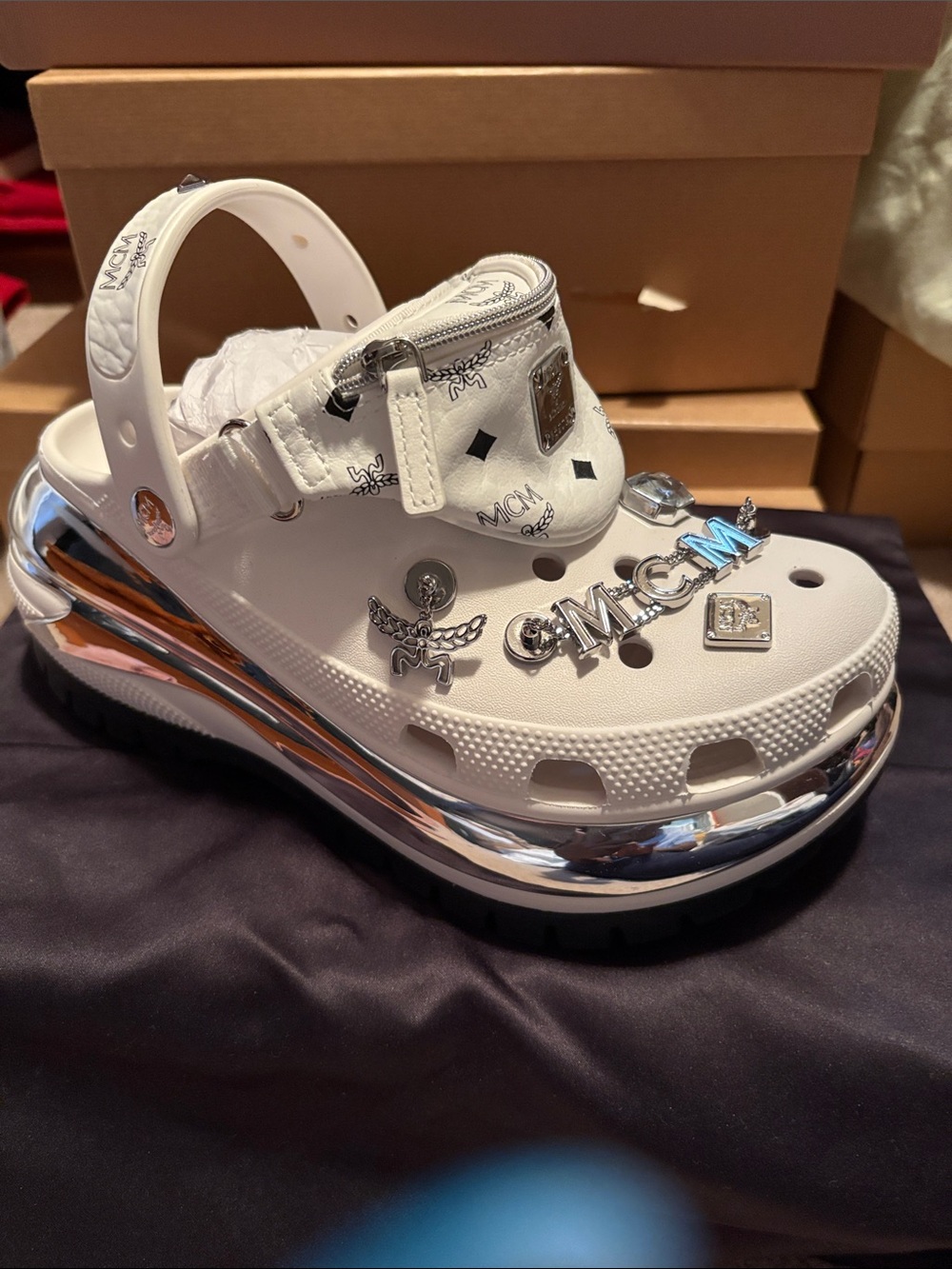 MCM White women’s Platform Clog with Silver Metallic Trim and Charms